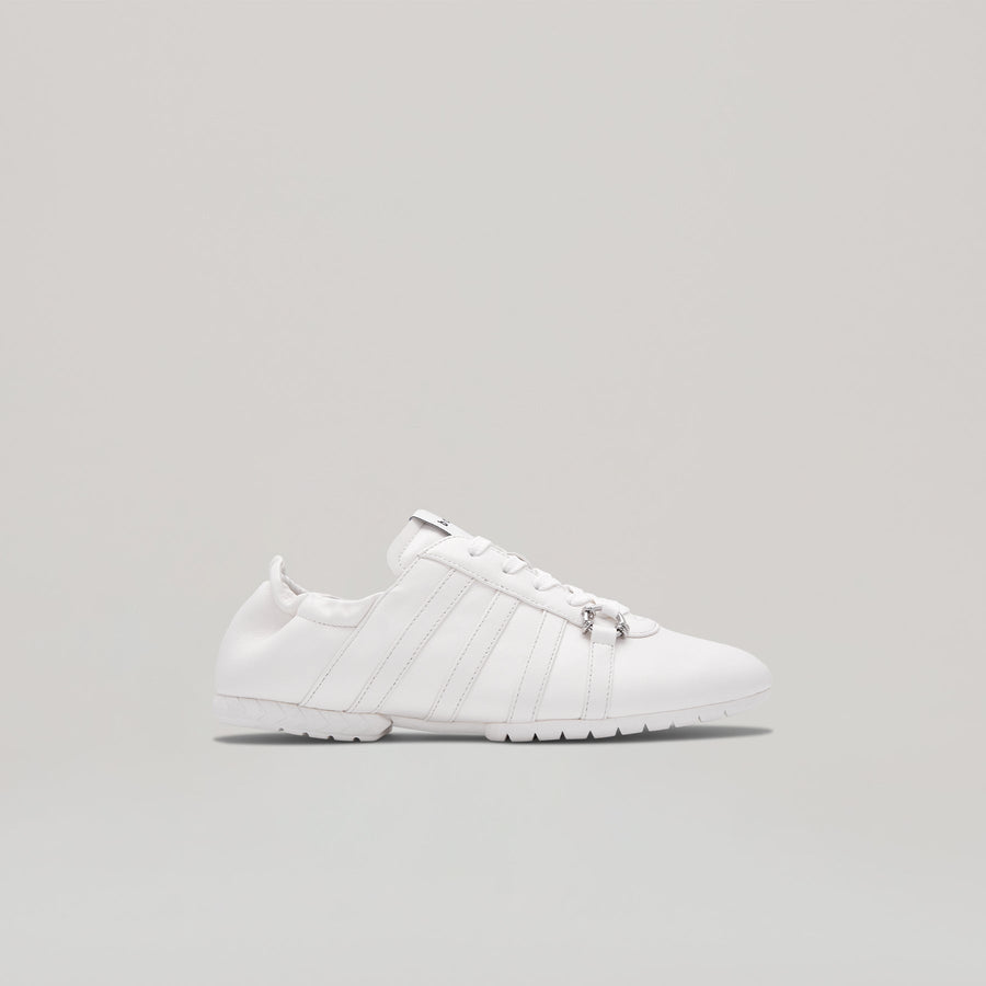 White TYRES GLIDER laced up sneaker showcasing sporty flat design for casual comfort