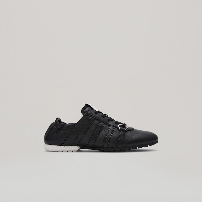 Black and white TYRES GLIDER laced up sneaker showcasing trendy design