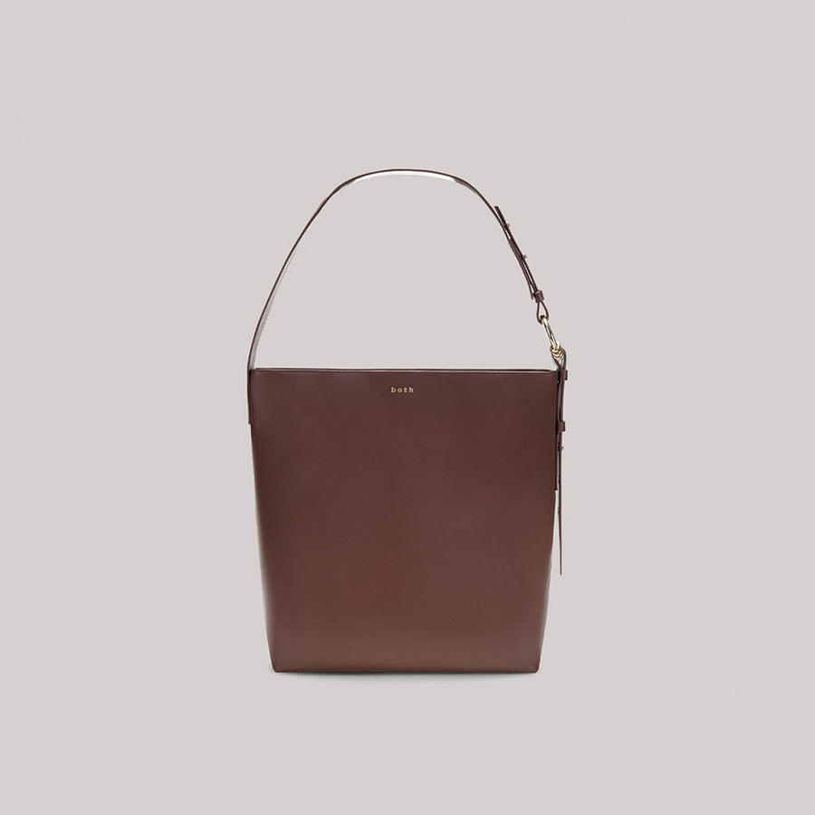 Brown GAO Tote Bag with spacious design and pierced leather details for everyday use