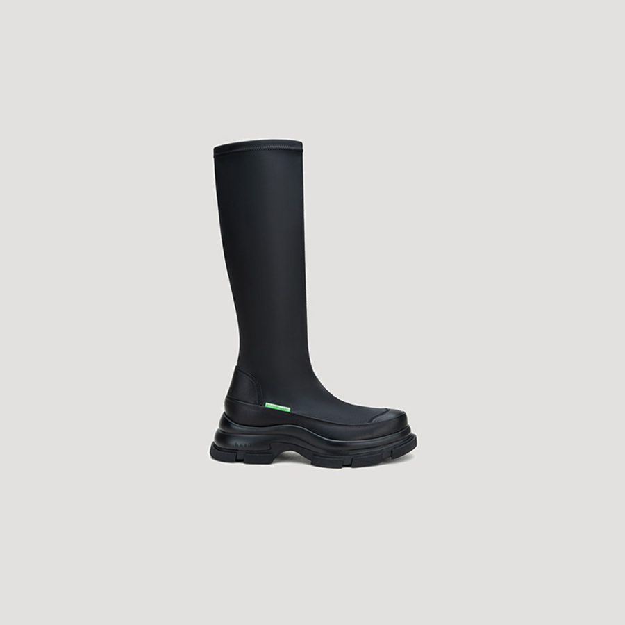 Black GAO EVA knee boots combining PU pleather and calf leather slip-on design