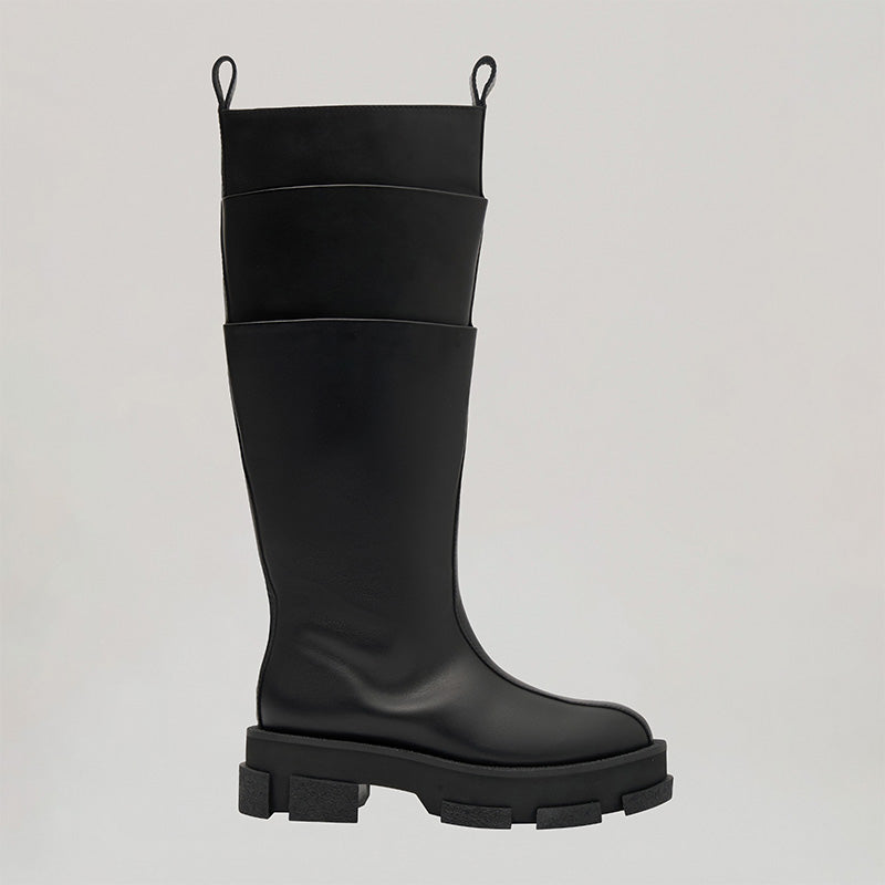 DION LEE-GAO platform cargo knee boot in black with toolbelt detail and platform sole