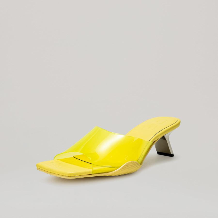 Yellow 40MM kitten heeled PVC mules with semi-transparent upper and diagonal metal heel
