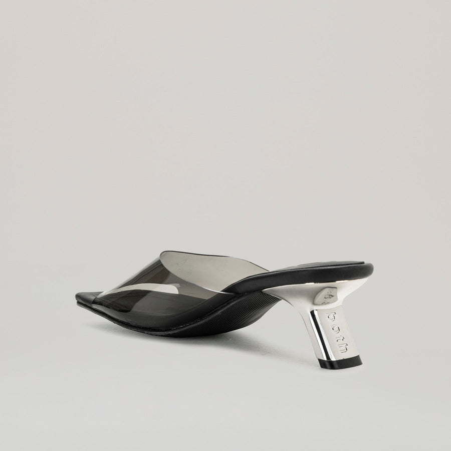 both - 40MM KITTEN HEELED black PVC mules with semi-transparent upper and diagonal metal heel