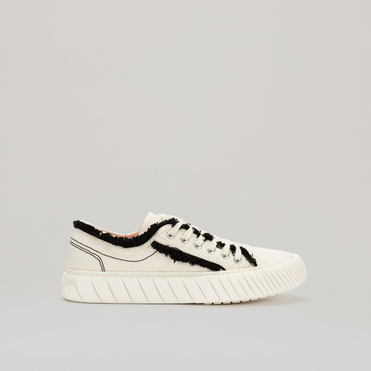 both - FORMULA LOW white sneaker with black fringe hem and durable EVA rubber sole