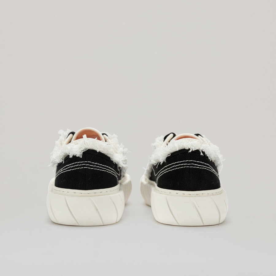 both - FORMULA LOW black canvas sneakers with white fringe hem and EVA rubber sole