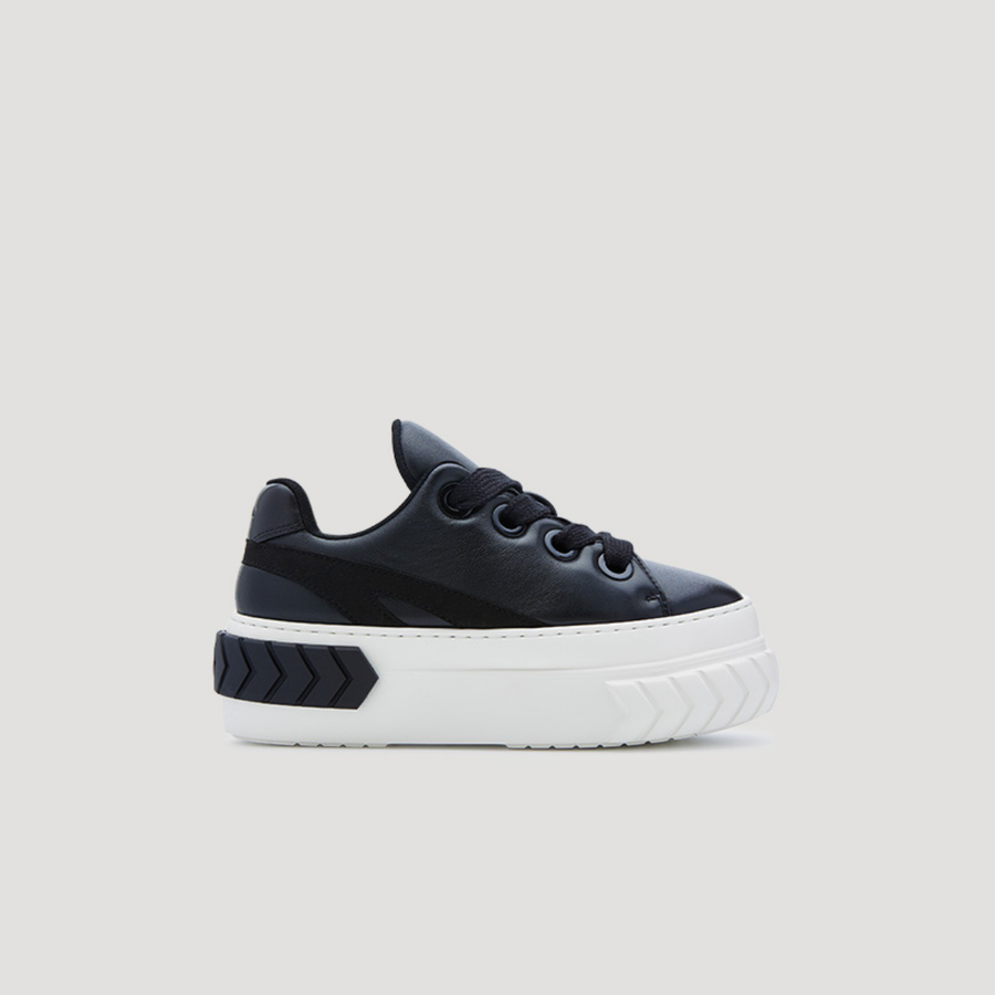 Black and white TYRES platform padded sneaker with subtle platform for added height