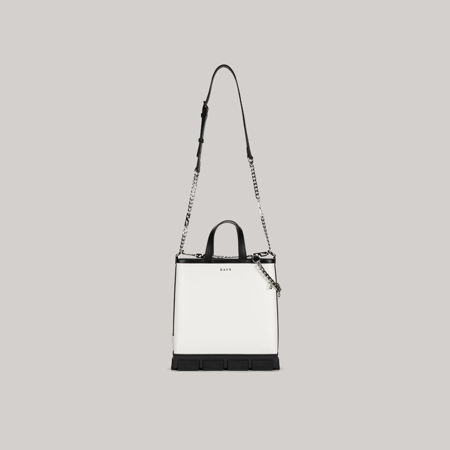 White and black GAO MINI TOTE BAG with detachable shoulder strap and top handles.