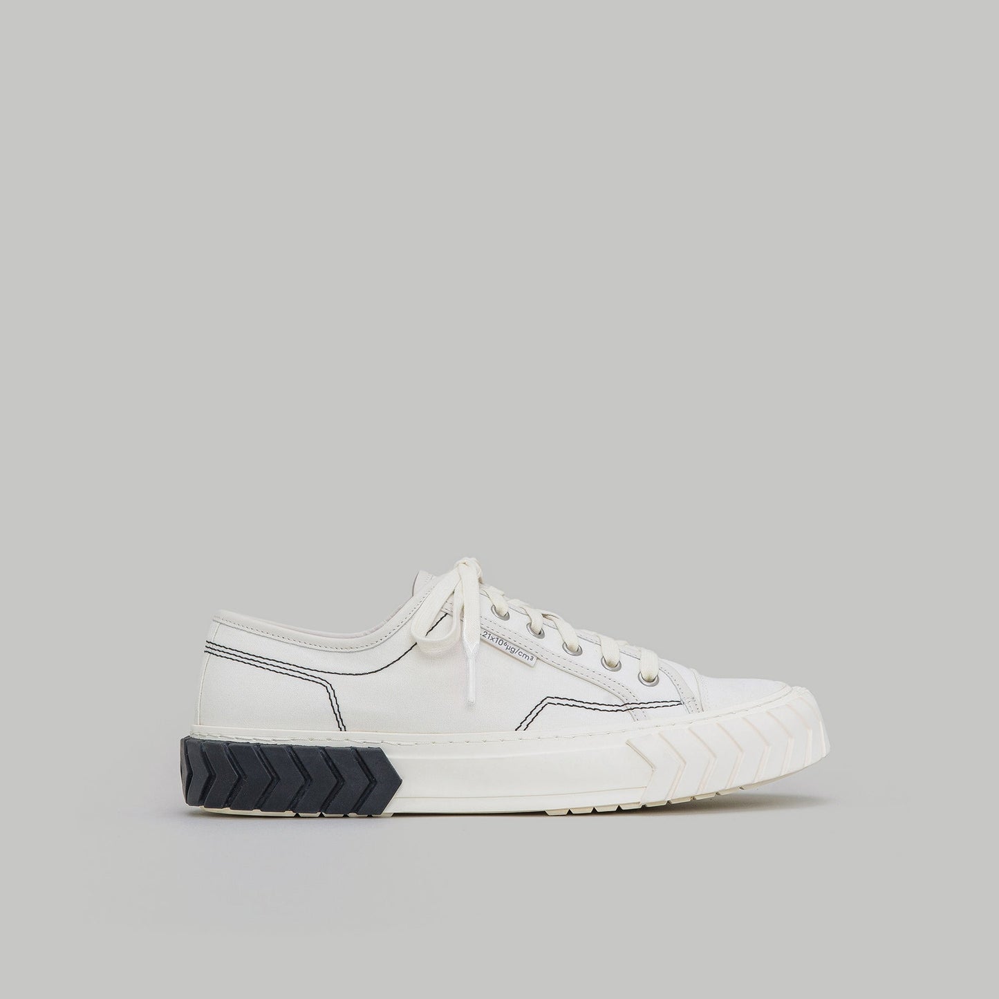 both - TYRES LOW TOP white and black low-top sneakers with minimalist design and durable sole