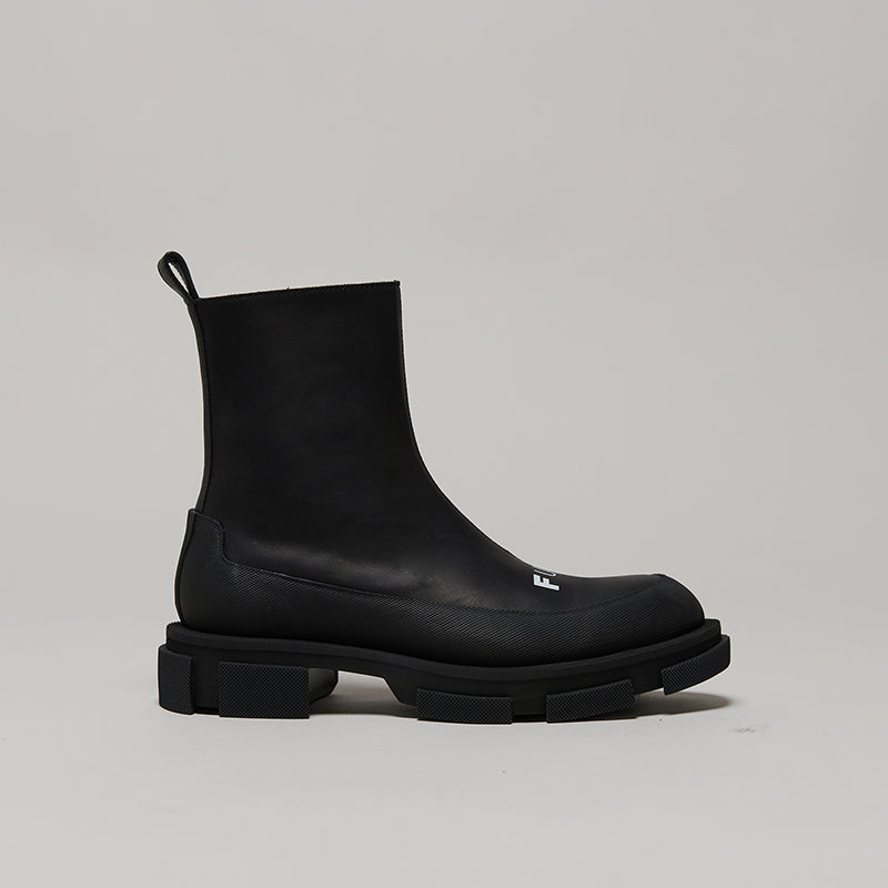 Black both X KIDILL GAO zip boot with chunky sole and sleek silhouette