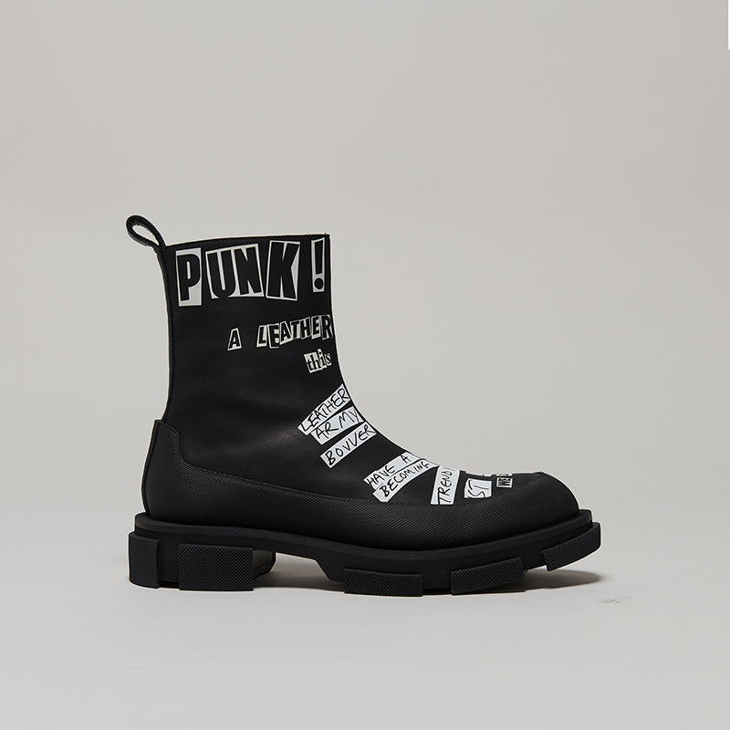black X KIDILL GAO ZIP BOOT with punk graphic text and chunky sole