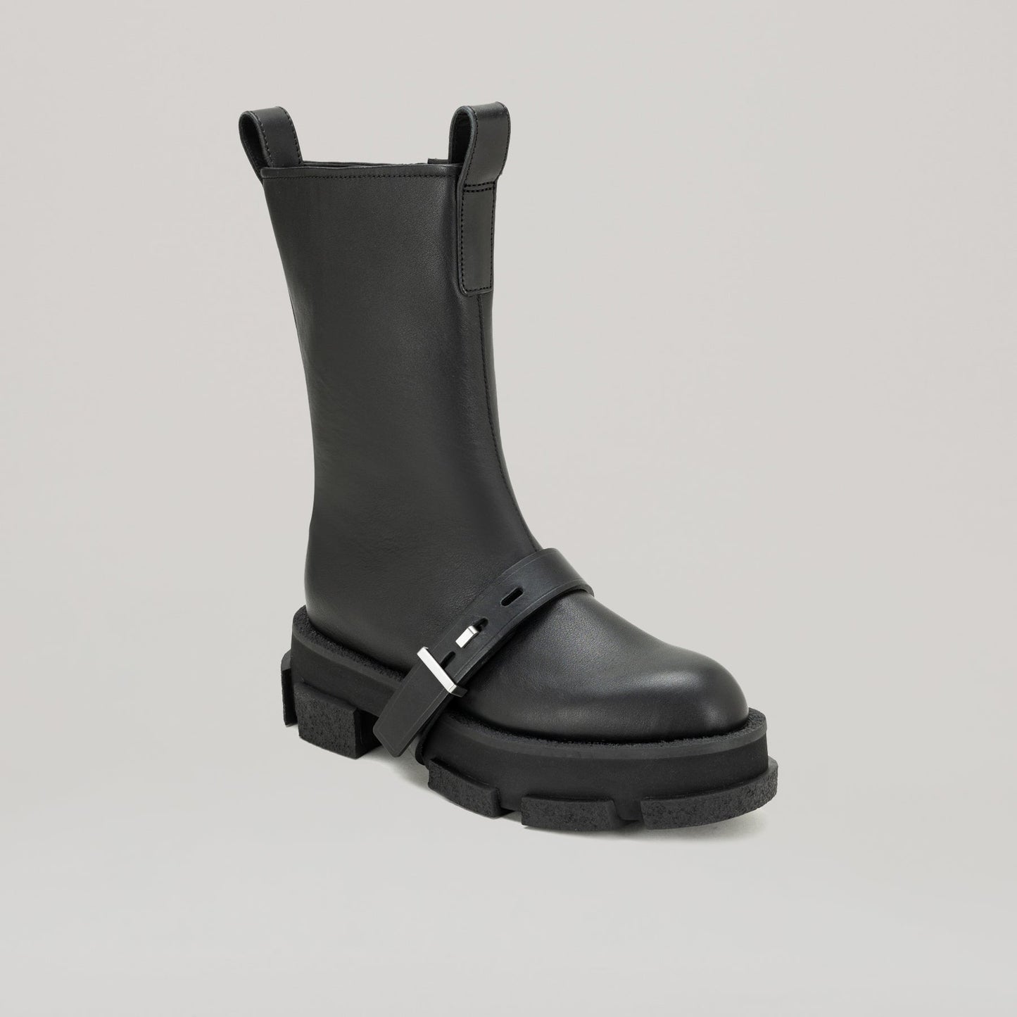 Black DION LEE-GAO platform work boot with sturdy sole and sleek design