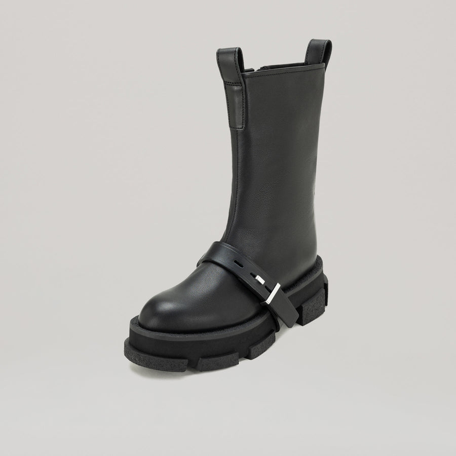 Black DION LEE-GAO platform work boot with chunky sole and strap detail