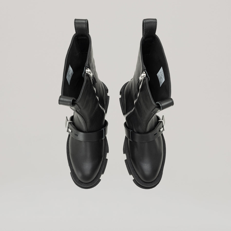 both x DION LEE-GAO black platform work boots with chunky sole and buckle detail