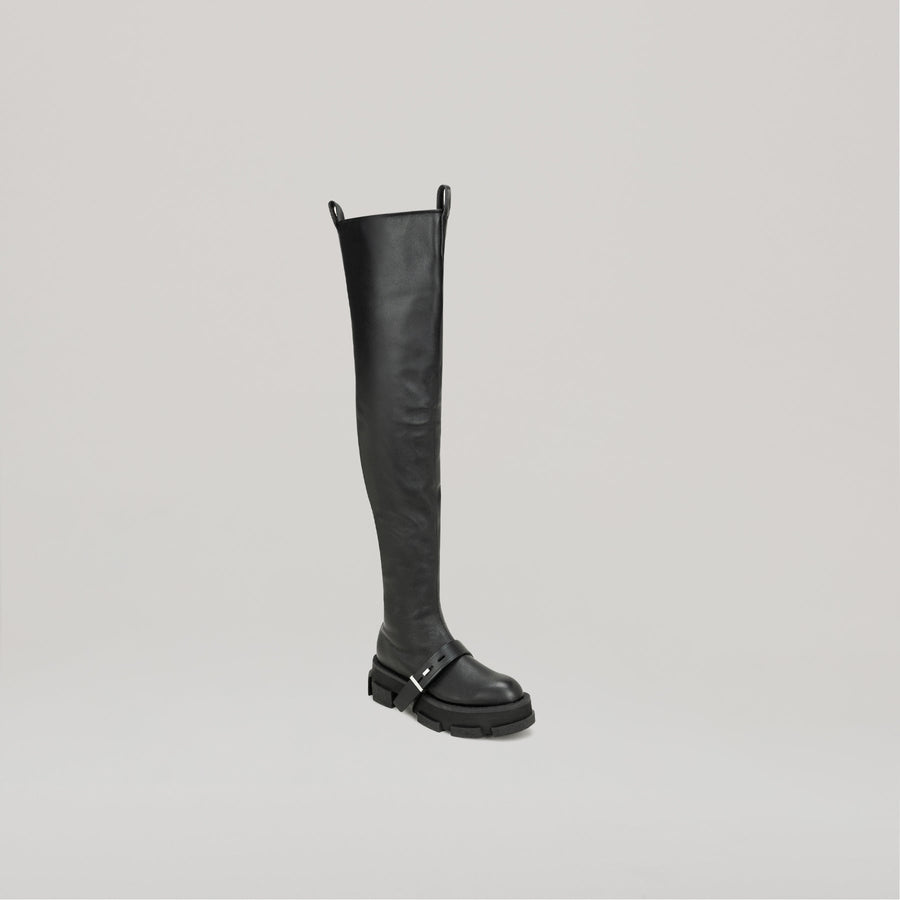 DION LEE-GAO platform black thigh high boot with chunky sole and buckle detail