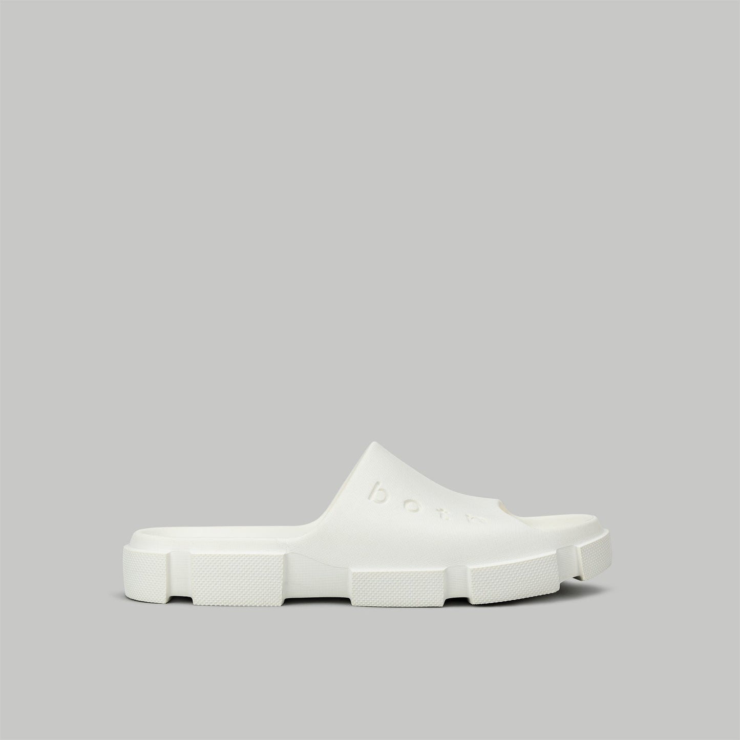GAO SLIDES-WHITE ergonomic white slides with chunky sole and minimalist design on grey background
