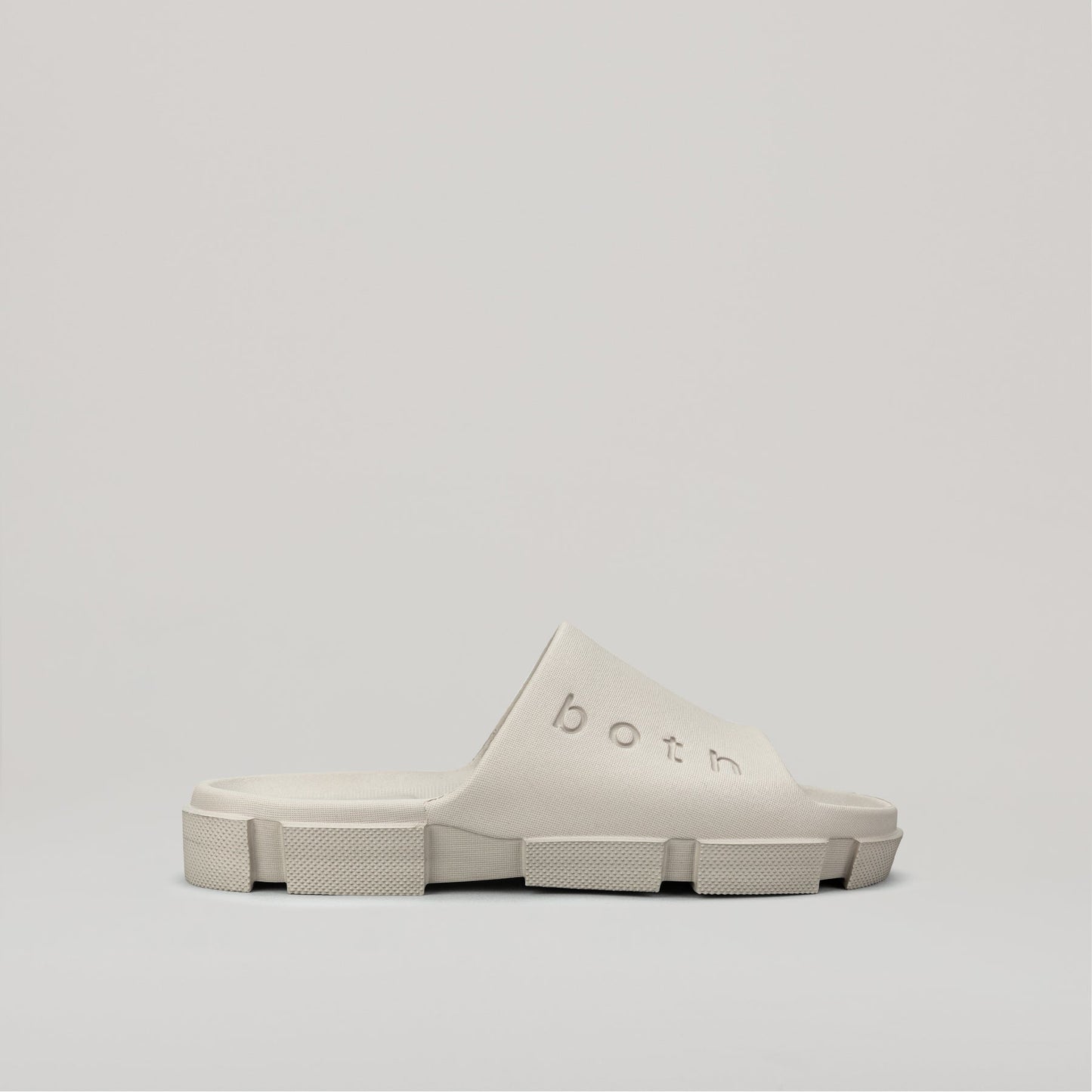 side view of grey both GAO SLIDES with ergonomic footbed and chunky sole