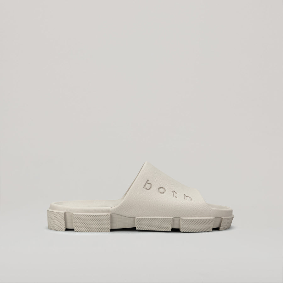 side view of grey both GAO SLIDES with ergonomic footbed and chunky sole