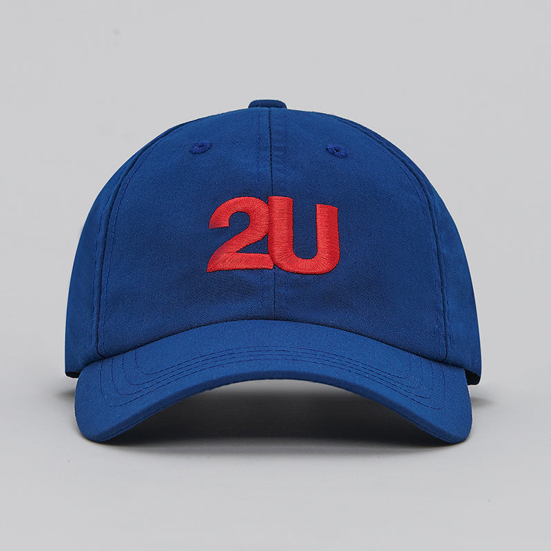 both X SECOND blue 2U cap with red embroidered logo front view