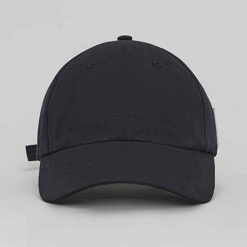 both X SECOND LAYER black SLXBOTH tag cap front view