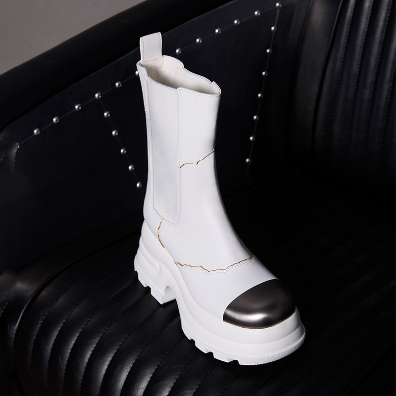 both x CHARLES & KEITH white Chelsea boot with metallic toe cap on black leather seat