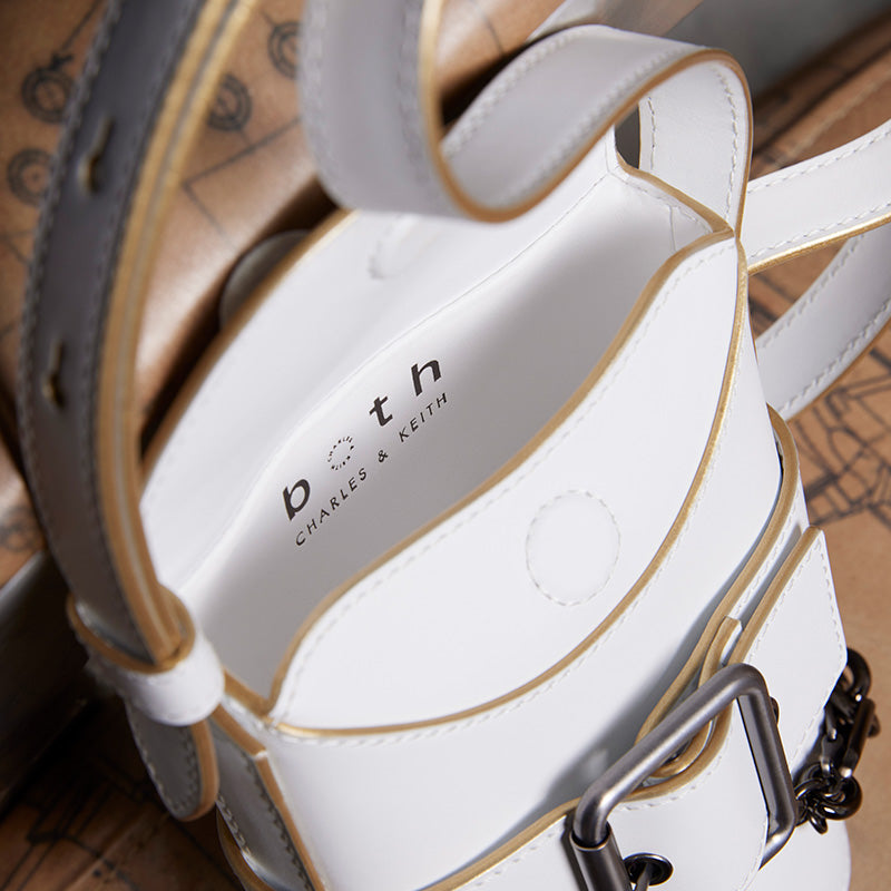 both x CHARLES & KEITH white bucket bag with spacious interior and structured design